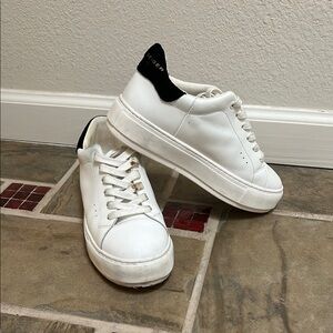 White Sneakers with Black Accents